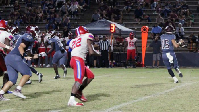 Kane Lafortune rolls out of the pocket